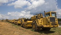 Construction equipment belonging to Crider &amp; Crider sits idle Tuesday along Ind. 37 in the Section 5 of the I-69 extension project between Bloomington and Martinsville. Staff photo by Jeremy Hogan