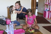 Karen Stasak lost the father of her two children last October to a heroin overdose. With her are her daughters Natalia Okleshen, 5 left, and Lilliana Stasak, 7. Staff photo by John J. Watkins