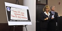 Allen County Health Commissioner Dr. Deborah McMahan and Indiana Attorney General Greg Zoeller unveil new state bill boards. Staff file photo