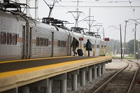 Riders board a South Shore passenger train at South Bend International Airport in this file photo. Staff file photo by Santiago Flores