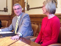 Gov. Eric Holcomb, left, announced Thursday in the governor's office that he is declaring a state disaster emergency due to lead contamination at the East Chicago Superfund site. He was joined by Lt. Gov. Suzanne Crouch. Staff photo by Dan Carden
