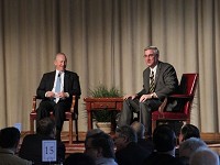From left, Purdue University President Mitch Daniels and Indiana Gov. Eric Holcomb talk infrastructure during the Road School Transportation Conference and Expo on March 8, 2017, in West Lafayette. Staff photo by Jeremy Ervin