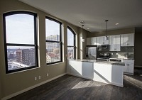 A kitchen inside an eighth-floor apartment at Studebaker Lofts in downtown South Bend. Staff photo by Robert Franklin