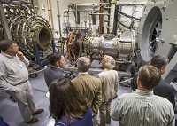 People tour the testing facilities in June 2016 during an open house at the Notre Dame Turbomachinery Laboratory at Ignition Park in South Bend. The university is a key partner in the North Central Indiana Regional Devlopment Authority. Staff photo by Robert Franklin, South Bend Tribune