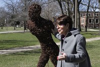 Judy Jacobi, assistant vice chancellor of the University Art Collections and Special Programs at Purdue University Northwest, explains the sculpture, Boundless, by Boyan Marinov, one of the many pieces of art on th Hammond campus. Staff photo by Kale Wilk