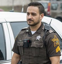 In this photo from January 2016, Sgt. Nathan Peach of the Monroe County Sheriff's Office wears a body camera on the front of his uniform shirt. Staff file photo by David Snodgress