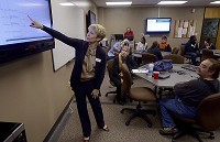 Ivy Tech Community College President Sue Ellspermann shows students a website where they can track various jobs in the state and details about them on an Oct. 31, 2016 visit on the Terre Haute campus. Staff file phoeo by Joseph C. Garza