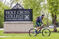 A student rides a bike Wednesday on the Holy Cross College campus in South Bend. Staff photo by Robert Franklin