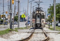 The South Shore train heads west along Bendix Avenue in South Bend on Wednesday. Staff photo by Robert Franklin