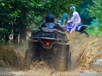 ATV riders enjoy the trails at Badlands in Attica. Photo by Chad Krockover for the Journal &amp; Courier)