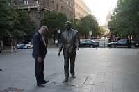 Gov. Eric Holcomb inspects a statue of former U.S. President Ronald Reagan at Liberty Square in Budapest, Hungary.&nbsp; The statue was unveiled in 2011 in recognition of Reagan's efforts to end the Cold War, during which Hungary was under the Soviet Union's sphere of influence. IEDC photo