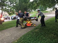 Emergency personnel repond to an overdose in Seminry Park on Thursday, July 22, 2017. Staff photo by Abby Tonsing