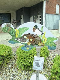 This turtle by Connie Beaman is at the corner of Bellefontaine and Wayne streets in Hamilton. Staff photo by Amy Oberlin