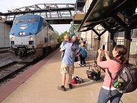 Passengers prepare to board the Cardinal at the Amtrak platform Thursday, June 29, 2017, at Riehle Plaza. On this morning, the Cardinal, which is scheduled to arrive at 7:36 a.m., arrived at 8:12 a.m. Staff photo by John Terhune
