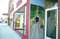 Not all murals are large. This one, titled &ldquo;Amish Trail,&rdquo; can be found in the doorway of a business on Cavin Street in Ligonier. Staff photo by Kelly Lynch