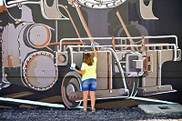 Though North Putnam High School art teacher Holly Cooper designed and painted much of the mural, many volunteers such as Joanie Knapp (above) came out to show their personal support. Courtesy photo