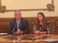 Gov. Eric Holcomb, left, announces Thursday that he is appointing LaPorte Mayor Blair Milo, right, to the new state cabinet-level post of secretary of career connections and talent. She will resign from the mayor's office next month. Staff photo by Dan Caren