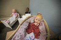 Dolls adorn a room at the Indiana Department of Child Services in South Bend where children are taken initially after being removed from a local home. Staff photo by Santiago Flores