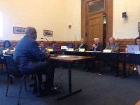 State Rep. Charlie Brown, D-Gary, seated foreground, speaks Wednesday to the General Assembly's Interim Study Committee on Roads and Transportation about his belief that it's time to eliminate vehicle emissions testing in Lake and Porter counties. Staff photo by&nbsp; Dan Carden, The Times