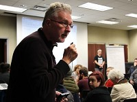 In this November 2016 photo, Bill Mullen, an American studies professor at Purdue, talks about a collection of white supremacist posters found plastered across Purdue University. Mullen among a handful of faculty members across the country who created the Campus Antifascist Network to help academics respond when similar incidents happen on their campuses. The Campus Antifascist Network now has 450 members.(Photo: J&amp;C file photo)