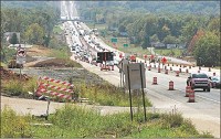 Construction on I-69 is seen Tuesday from North Showers Road north of Bloomington.