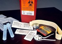 A syringe exchange program kit from the Madison County Health Department in Indiana is shown. The Madison County Council voted to end funding for the program. Staff photo by John P. Cleary