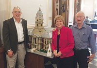 Left, Dr. Rev. John Van Nuys, and Clocktower Committee members Sandra Lofland-Brown and Ken Brown are all smiles after the county council approved a plan to finance the completion of the clock tower. Brown has worked for 21 years on the clock tower project and spoke in favor of it at Tuesday's council meeting. Staff photo by Bob Cox
