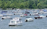 Dozens of boats are moored to buoys at Quakertown marina on the north end of Brookville Reservoir in this file photo. Staff photo by Don Knight