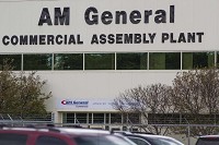 Workers leave the AM General Commercial Assembly Plant in Mishawaka in this June 2017 file photo. AM General has sold its commercial assembly plant to SF Motors, the subsidiary of a Chinese company that plans to build electric vehicles at the Mishawaka plant. South Bend Tribune file photo/MICHAEL CATERINA