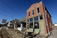 The Old Town Hall and former bank on Ind. 64 in Georgetown was built in the early 1900s. Town officials, eager to repurpose the historic building, say the space could be a perfect place for local artists to display their work. Staff photo by Josh Hicks