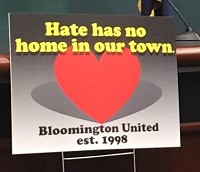 A poster proclaims the mssion of Bloomington United during a news conference Wednesday at City Hall. Staff photo by Jonathan Streetman