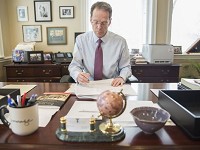 Ball State University President Geoffrey Mearns works in his office on Jan. 9, 2018 at the start of the spring semester. He is launching a committee to draft a new strategic plan. Photo by Corey Ohlenkamp/The Star Press