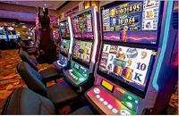 The video gaming machines shown here at Four Winds South Bend last week, may look like traditional slot machines, but they&rsquo;re not. They are actually a version of bingo that seems very similar to typical slot machines. Tribune Photo/ROBERT FRANKLIN