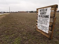 Notice of request for rezoning posted in a field off Dayton Road Wednesday, February 21, 2018, just south of Dayton. Staff photo by John Terhune/Journal &amp; Courier