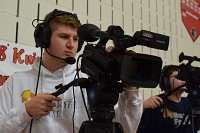 Matt Holman, a senior at Greenfield-Central High School, films a basketball game at Knightstown, Feb. 20, 2018. The NineStar Films crew travels to all kinds of sporting events in Hancock County and beyond providing content for Channel 9. Staff photo by Evan Myers