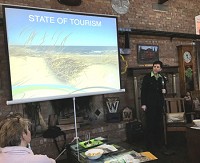 Lorelei Weimer, executive director of Indiana Dunes Tourism, speaks Thursday about the state of tourism in Porter County. Staff photo by Doug Ross