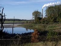 Vectren's coal ash pond at the A.B. Brown Generating Station is seen from homes on Welborn Road in Evansville, Ind., on Thursday, Oct. 26, 2017. (Photo: MARLENA SLOSS / COURIER &amp; PRESS)