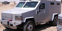 Bloomington Mayor John Hamilton announced Thursday that he is proceeding with the purchase of an armored vehicle for the Bloomington Police Department. The Lenco BearCat will now be light gray instead of dark blue.