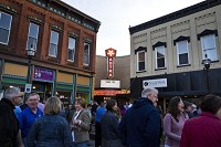 People lingered on Courthouse Square after the lighting of the Astra Theatre sign and marquee at the recently renovated and refurbished Astra theatre in Jasper on Wednesday evening. Staff photo by Sarah Ann Jump For more photos from the event, click here.