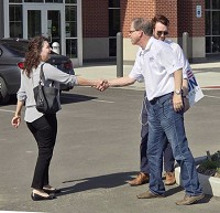 Mike Braun shakes hands with a voter Tuesday at Zionsville Town Hall. Braun was running for the Republican nomination for U.S. Senate. CNHI photo by Scott L. Miley