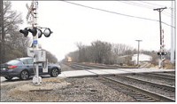 A CAR crosses the railroad tracks along C.R. 13 in Dunlap in this January 2017 file photo. Staff photo by Roger Schneider