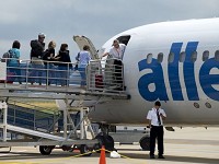 Passengers board the Allegiant Air flight to Orlando, Fla., at the Owensboro-Daviess County Regional Airport Friday afternoon.&nbsp;(Photo: DENNY SIMMONS / COURIER &amp; PRESS)
