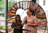 Community Montessori students Hunter Gentry and Samantha Thomas discuss their part in the collaborative sculpture, &ldquo;Strong Together,&rdquo; between eight local high schools, inspired by the school shooting in Parkland, Fla.&nbsp;&nbsp;STAFF PHOTO BY TYLER STEWART