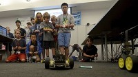 Robot race:&nbsp;Participants in the Connecting with Code computer camp at Rose-Hulman Institute of Technology race against one another with the robot buggies that they and their teammates created on Tuesday in Moench Hall. Staff photo by&nbsp;Joseph&nbsp;C.&nbsp;Garza