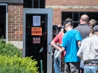 People wait in line to receive Hepatitis A vaccines during a clinic at the Wayne County Health Dept. on Thursday, July 19, 2018. Staff photo by Mickey Shuey