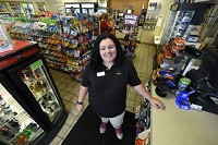 Melissa Hurtado works at a Village Pantry in Shelbyville. Staff photo by Tom Russo