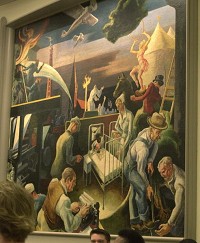 The Thomas Hart Benton mural includes a Ku Klux Klan rally in the background at center. Also included is a depiction of reporters writing about the Klan and for which The Indianapolis Times won a Pultizer Prize. The mural was part of a 22-panel series created for the 1933 Chicago World's Fair. Staff photo by David Snodgress