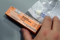 This is a dose of naloxone hydrochloride that can be sprayed up the nostril or injected to reverse the effects of an opioid overdose. Staff photo by Tim Bath