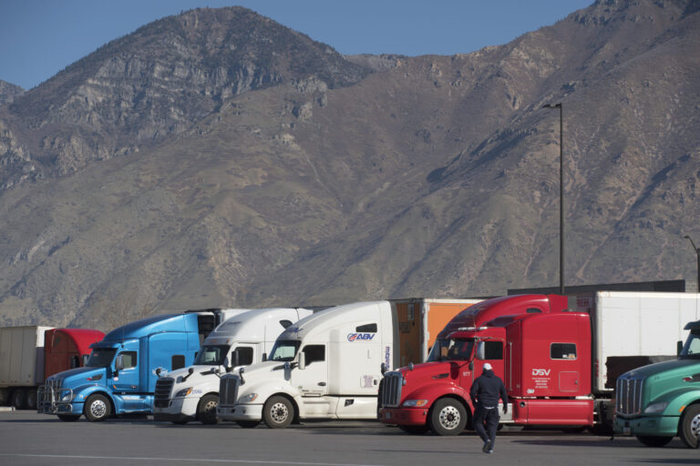 Truckers take a break at the Loves Truck stop on November 5, 2021 in Springville, Utah. (George Frey/Getty Images)