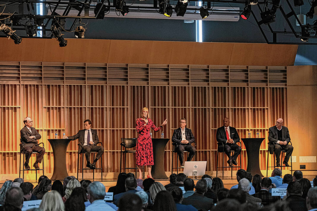 Candidates for Indiana governor from left: Sen. Mike Braun (R), Brad Chambers (R), Lt. Gov. Suzanne Crouch (R), Eric Doden (R), Curtis Hill (R) and Donald Rainwater (L) participate in a Gubernatorial Candidate Forum hosted by Gerry Dick, of Inside INdiana Business, during the Greater Columbus Indiana Economic Development Corporation annual meeting at The Commons in Columbus, Ind., Friday, Dec. 8, 2023. Staff photo by Mike Wolanin